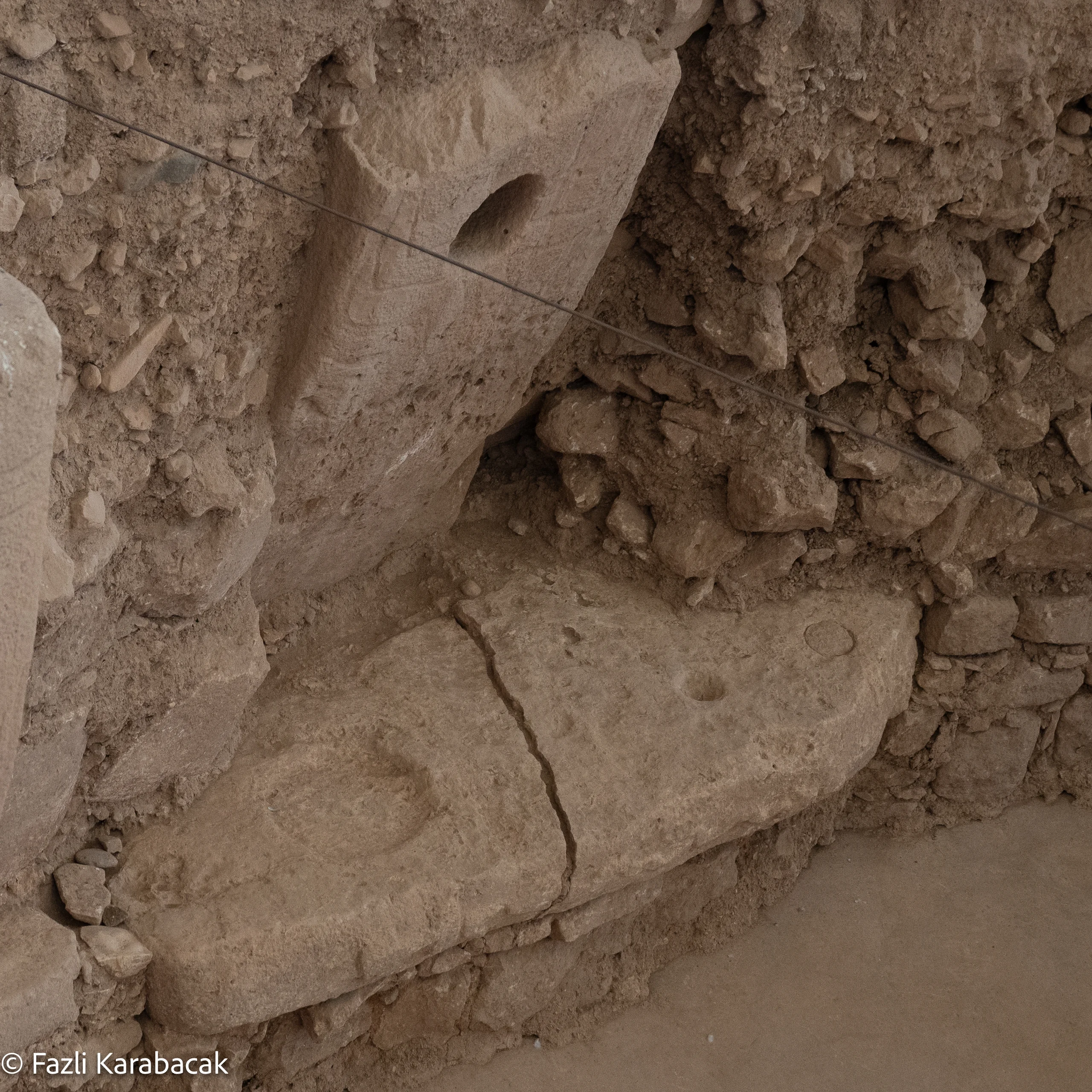 Bench-like structures along the inner walls of Enclosure D