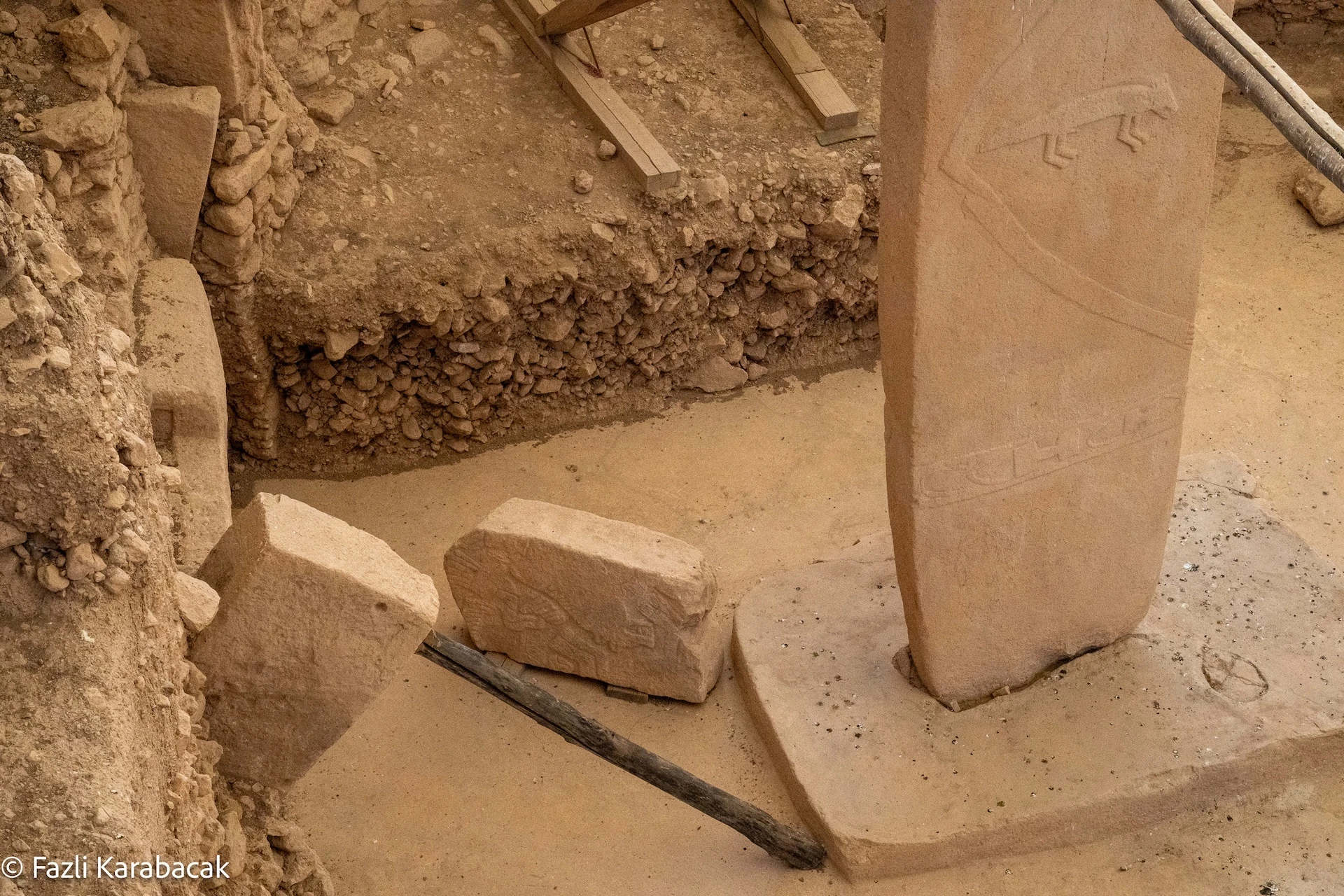 H-shaped symbol and abstract geometric signs carved into a pillar at Göbekli Tepe