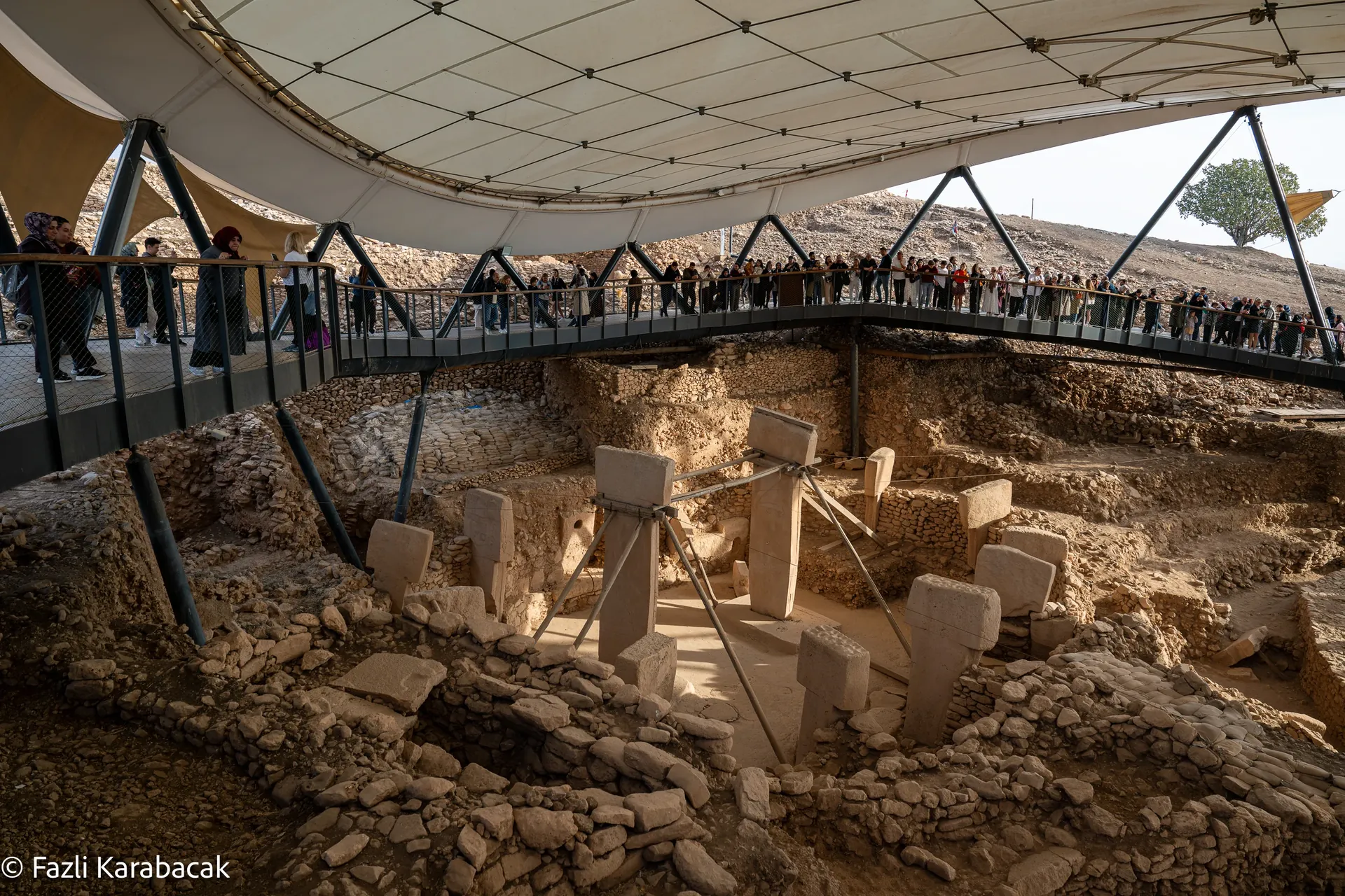 Atmospheric view of Göbekli Tepe pillars at dusk or blue hour